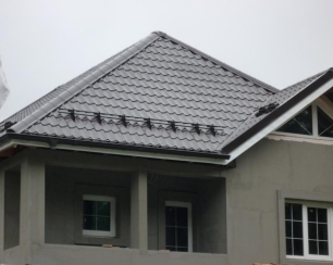 Всё о снегозадержателях для крыши